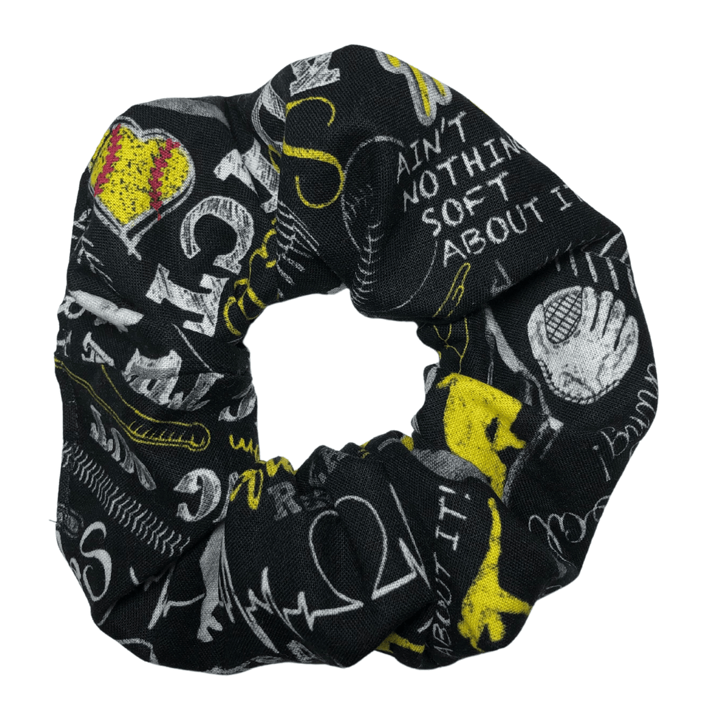 black softball scrunchie with softball words and pictures in white and yellow