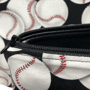 black zipper and interior of baseball makeup bag