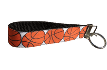 Load image into Gallery viewer, wristlet keychain with orange basketballs
