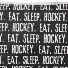 Load image into Gallery viewer, zipper pouch with eat sleep hockey printed in white on a black background

