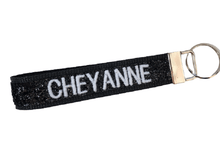 Load image into Gallery viewer, black glitter keychain personalized with cheyanne in white
