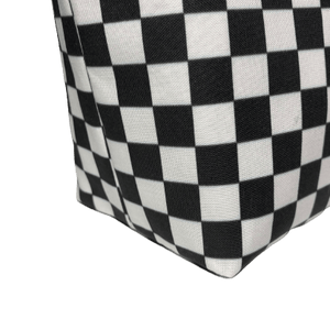 side of checkerboard makeup bags showing boxed out bottom construction