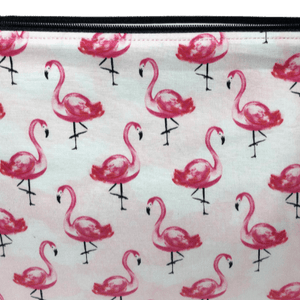 light pink fabric with hot pink flamingos