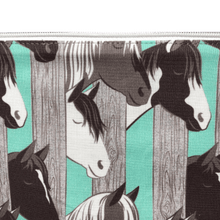 Load image into Gallery viewer, horse zippered bag with aqua and gray wide vertical stripes and horse heads poking through the stripes
