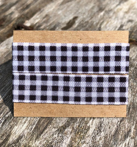 black and white plaid sleeve clips on display