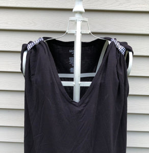 black tshirt with black and white checkered sleeve clips