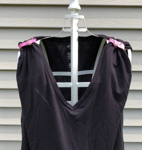black tshirt with hot pink lacrosse sleeve clips