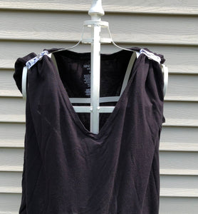 black tshirt with black and white cheer sleeve clips around short sleeves making tshirt a tank top