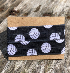black volleyball sleeve clips with white volleyballs