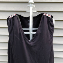 Load image into Gallery viewer, pair of football sleeve clips on black tshirt turning it into a tank top
