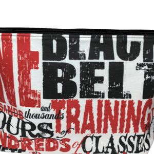 black belt fabric makeup bag with words like training, classes, black belt in black and red with white background