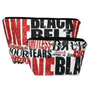 black, red, and white black belt words on set of makeup bags