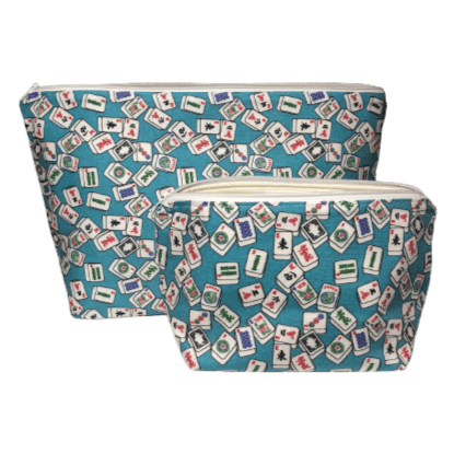 set of blue mahjong makeup bags