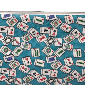 teal blue bag with mahjong tiles 
