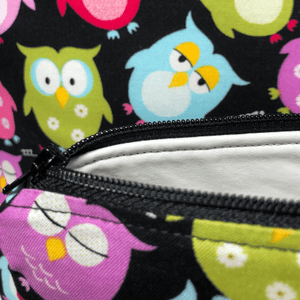zippered owl bags with black zippers and white vinyl lining