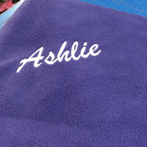 purple personalized fleece blanket with name Ashlie