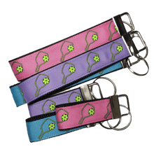 Load image into Gallery viewer, pickleball keychains in purrple, teal, and pink
