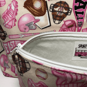 white zipper and lining on pink softball travel bag
