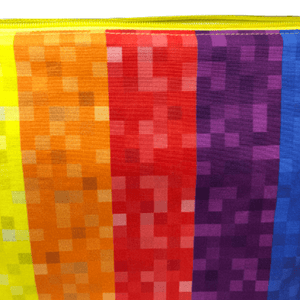 rainbow makeup fabric with colors in vertical wide stripes and varying shades in square pixels