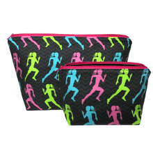 Load image into Gallery viewer, two small bags with blue, pink, and lime green silhouettes of woman running with black background and hot pink zipper
