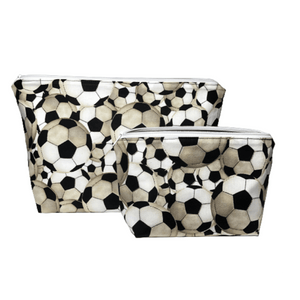 two zippered soccer bags with white zippers and balls on exterior fabric