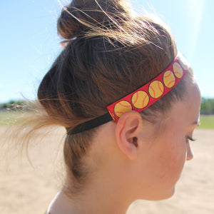 red softball headband on model