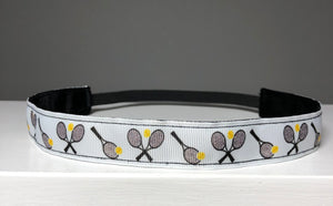 white tennis headband with crossed tennis raquets